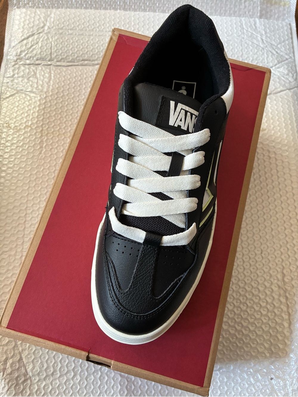 Vans Men’s Black and White Low-Top Sneakers